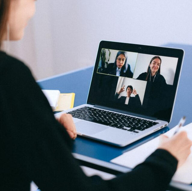 Three people on a Zoom call.